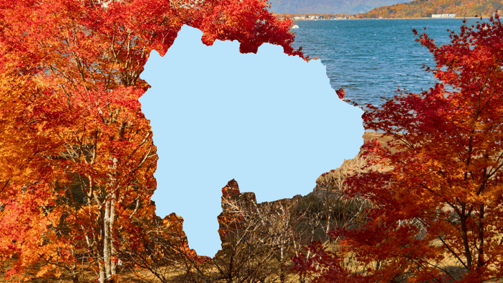 山梨県の形のシルエットと、紅葉したカエデ越しに見える山中湖の青い湖面